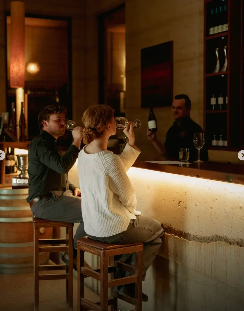 Guests tasting wine at the Margan cellar door bar in Broke