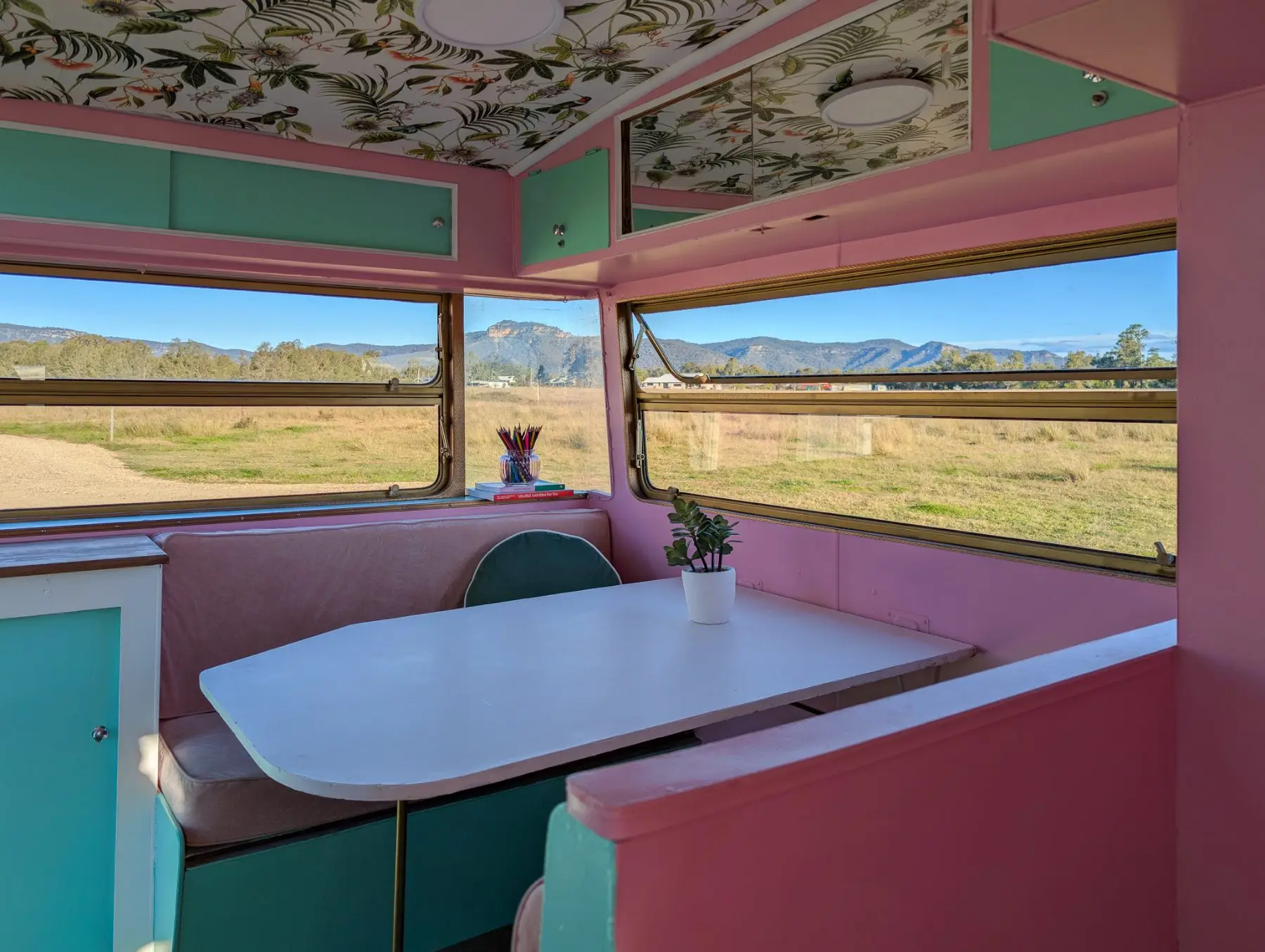 The dinette in the van looking out to the ranges